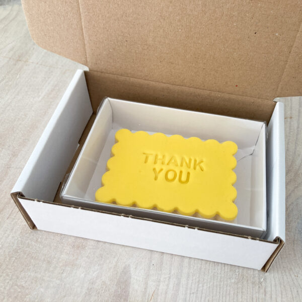 Shortbread biscuit with gift message embossed in postal packaging to send throughout the UK
