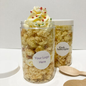 Plastic jar filled with vanilla sponge and buttercream with a logo branded personalised sticker to make a great gift.